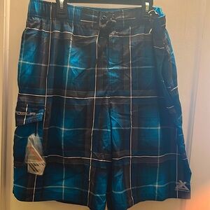 Men’s swim trunks Zeroxposur with side pockets and a small pouch inside.